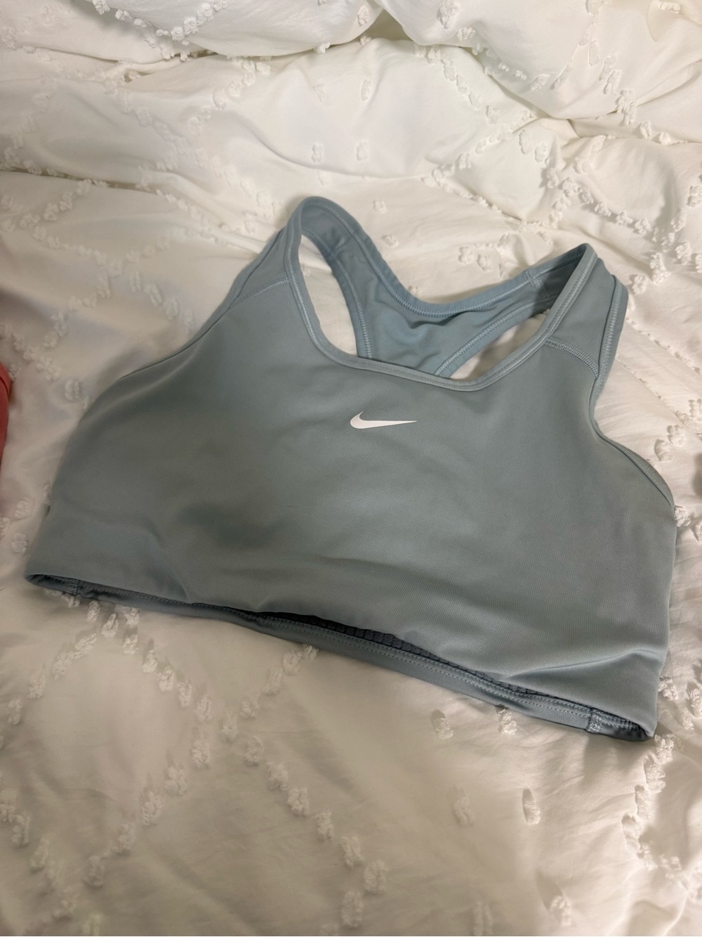 Nike Women's light Blue Racerback Sports Bra with White Swoosh